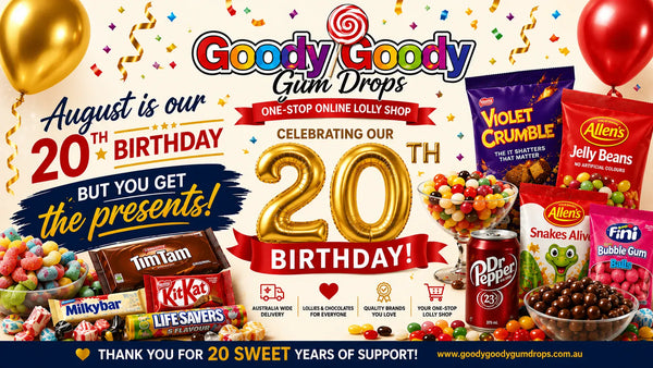 A promotional birthday banner for Goody Goody Gum Drops celebrating 20th birthday, featuring a collage of assorted sweets, chocolates, and candy bags including Violet Crumble, Allen's Jelly Beans, Snakes Alive, Tim Tam, Life Savers, and Dr. Pepper. The design includes gold balloons, confetti, and banners with text.